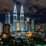 Petronas Towers At Night: Iconic Kuala Lumpur Skyline